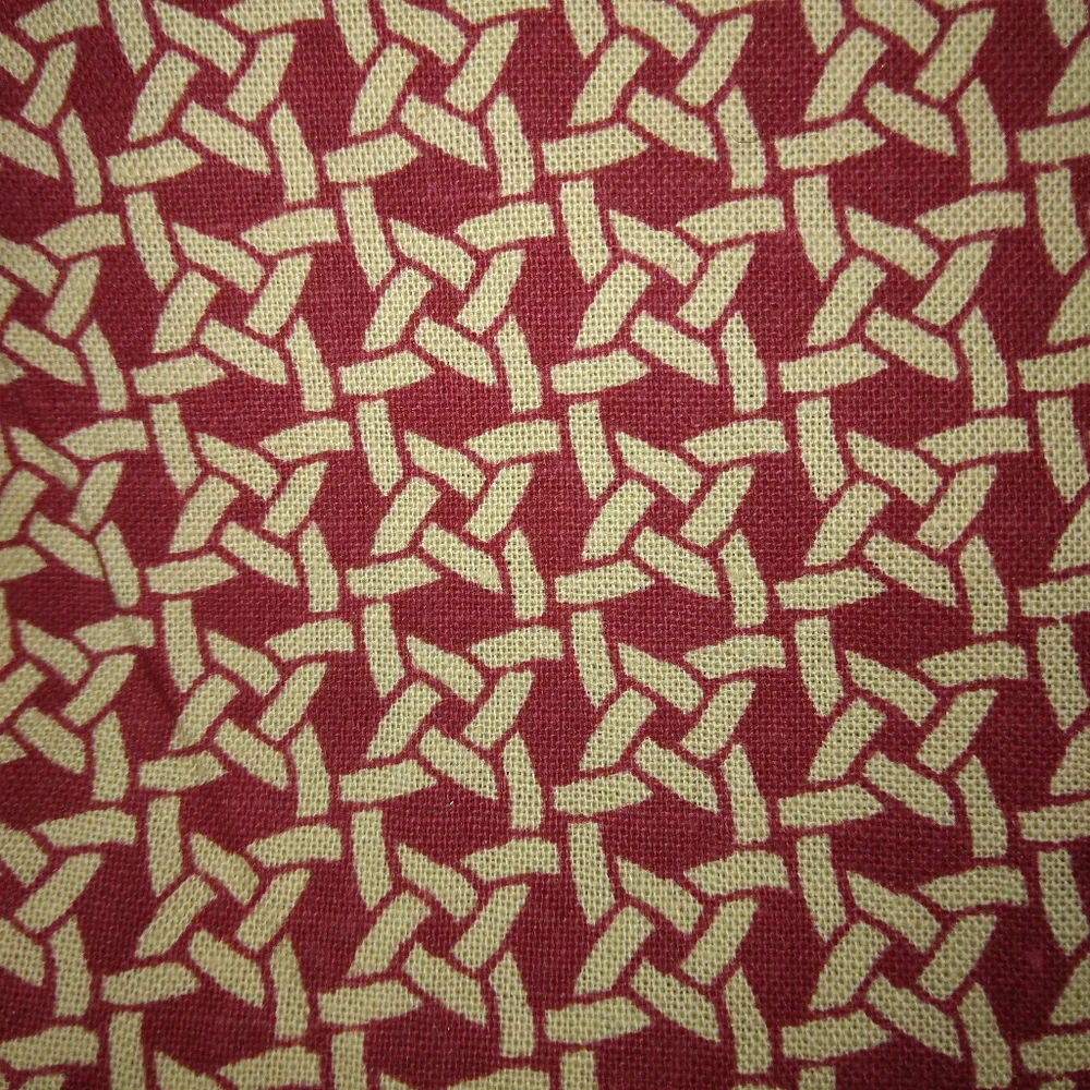 FABRIC Rattan woven look print on Maroon background, cotton. 32 inches